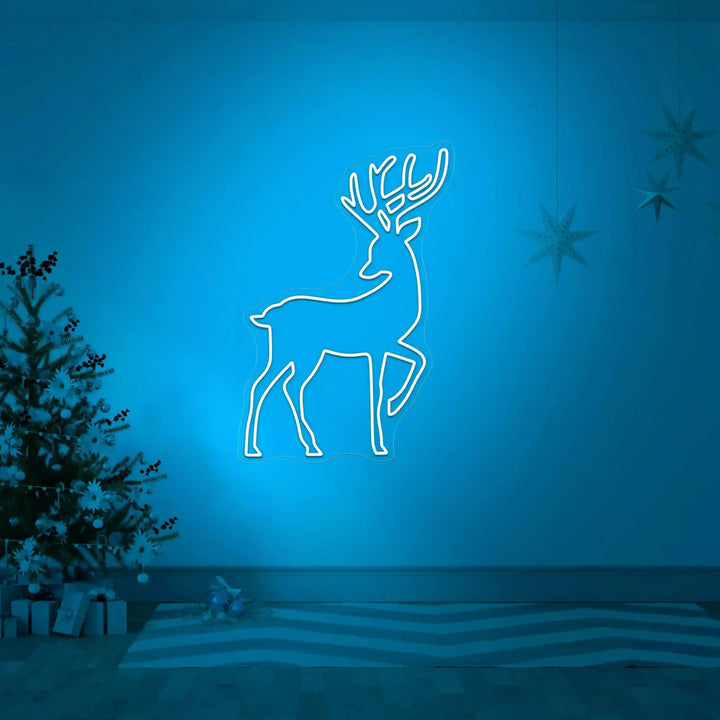 Reindeer Christmas Glow - a festive neon sign with a glowing reindeer design - from manhattonneons.com.