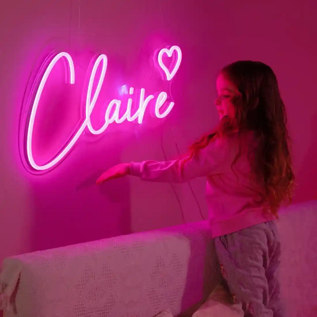 Custom Claire Name Neon Sign - from manhattonneons.com, adding a personal touch to your space with vibrant neon light.