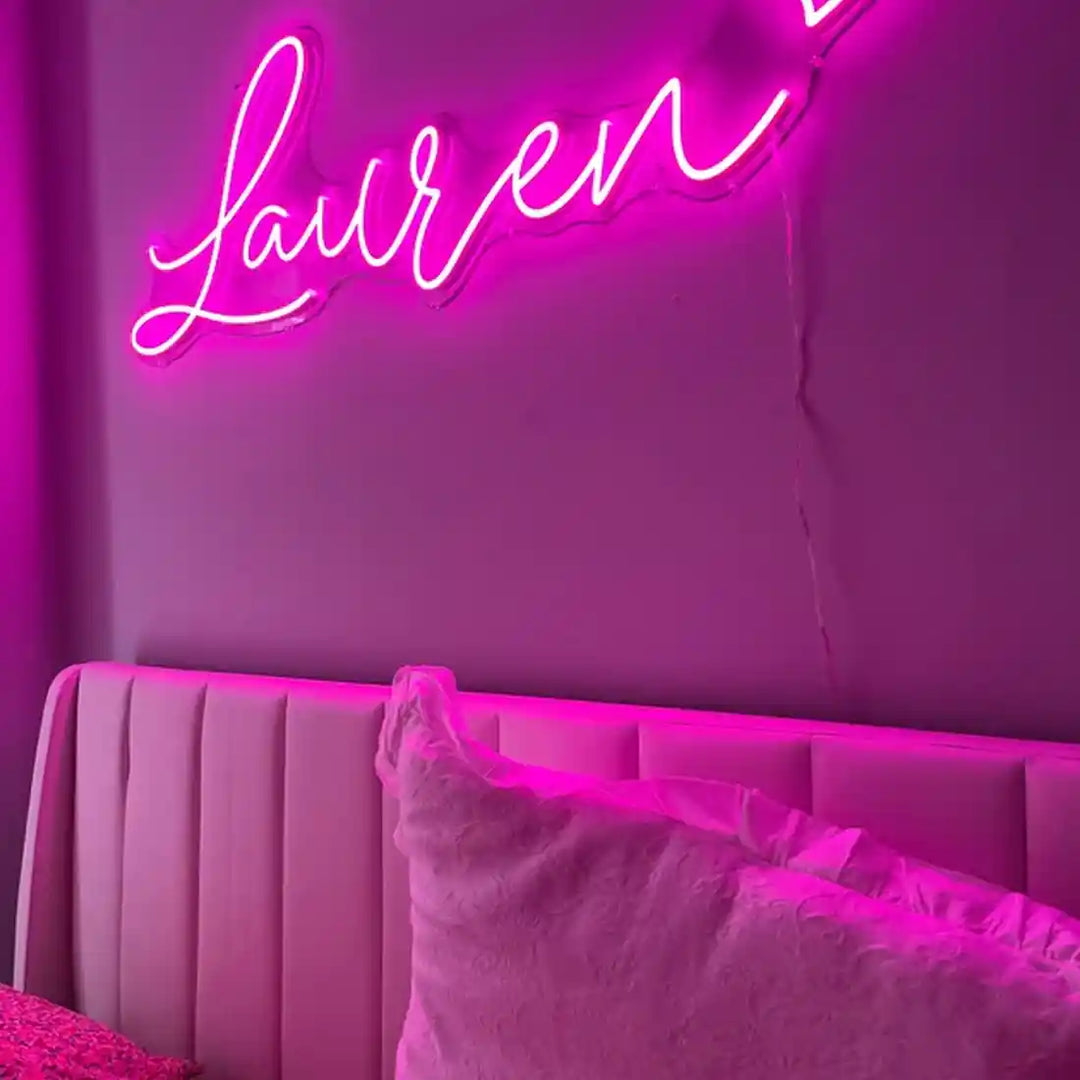 Glowing Lauren Name Neon Sign, adding a touch of personalized radiance to your space - from manhattonneons.com.