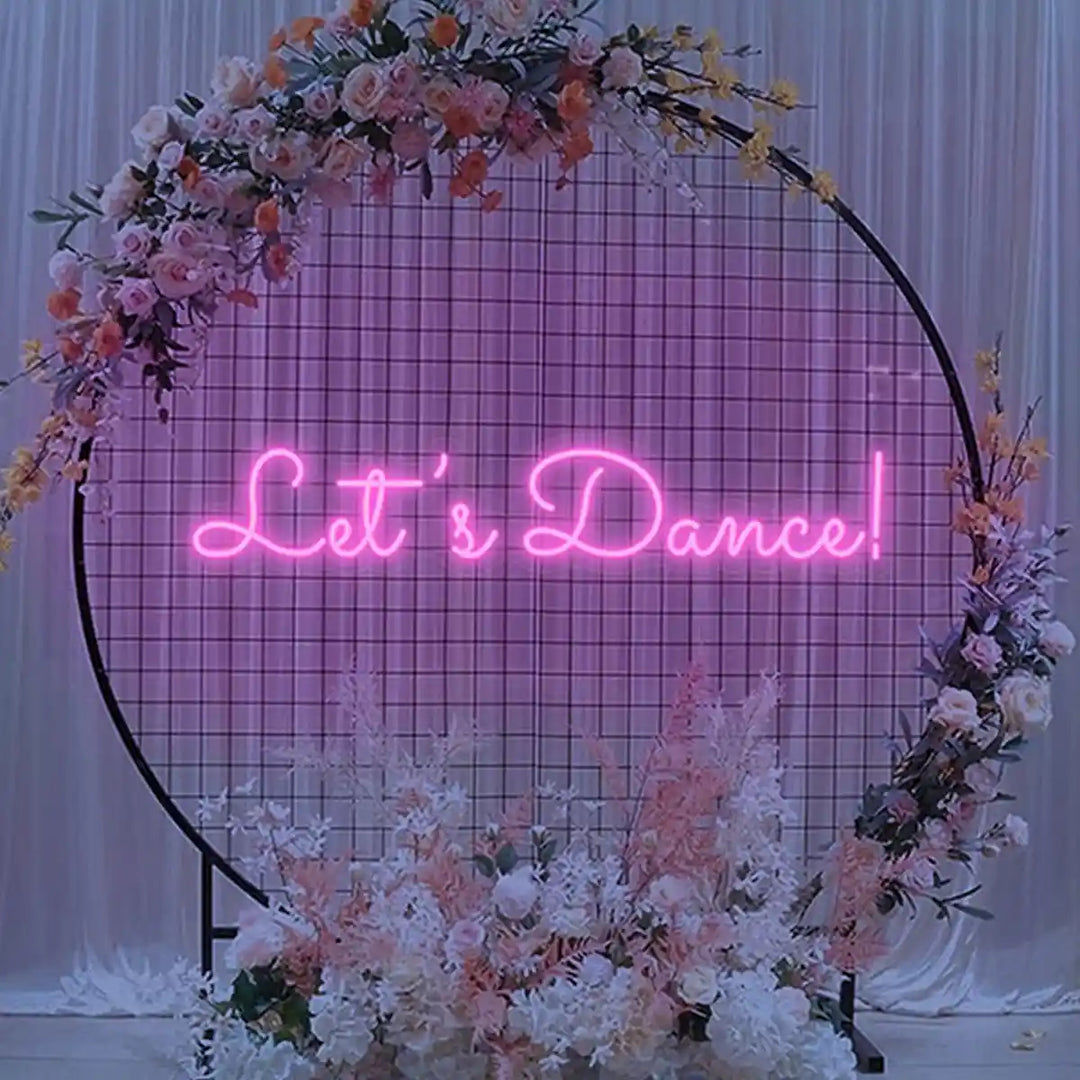 Let's Dance Wedding Neon Sign - A lively invitation to celebrate, this neon sign beckons guests to hit the dance floor and create unforgettable memories - from manhattonneons.com