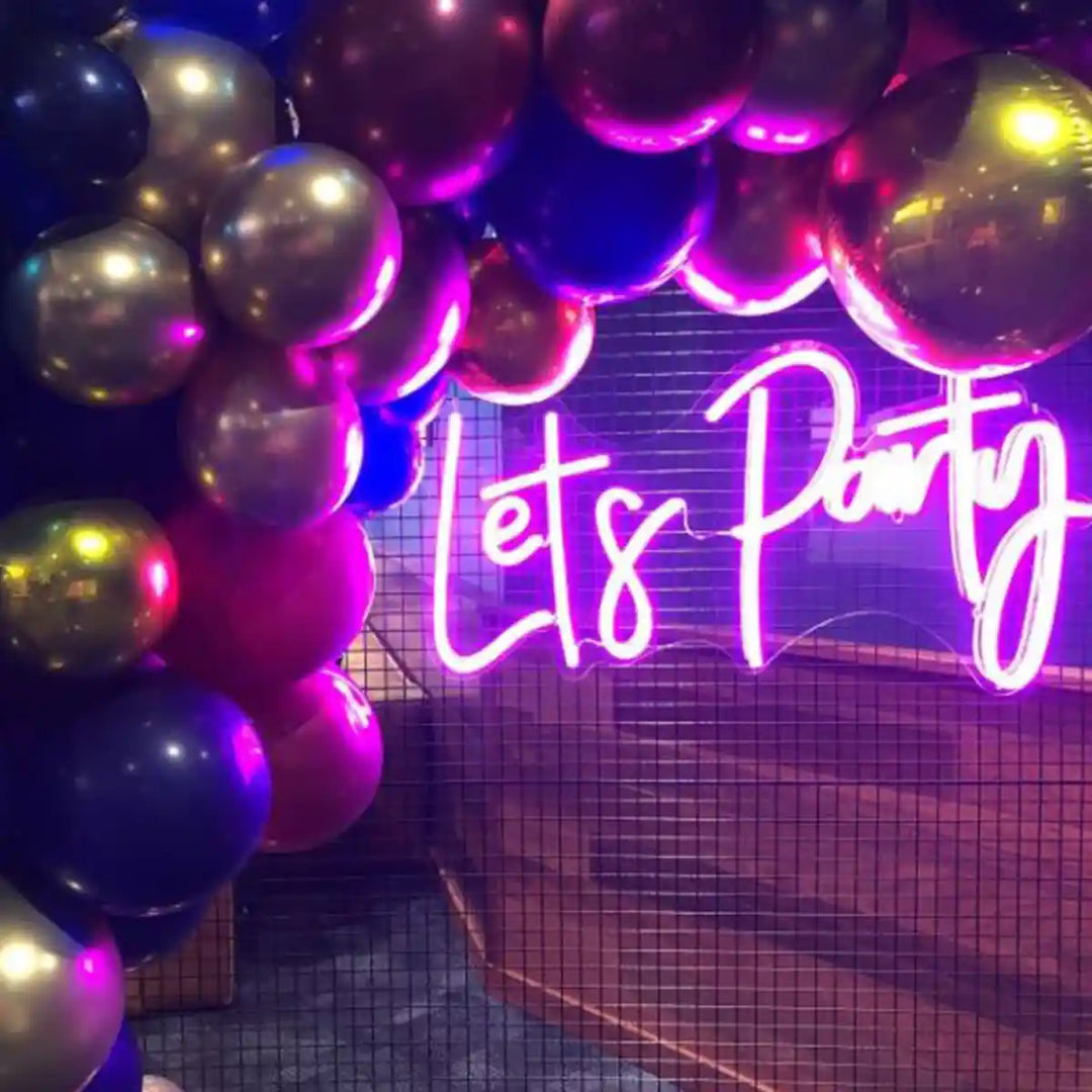 Let's Party Wedding Neon Sign - A vibrant invitation to celebration, illuminating joy and festivity - from manhattonneons.com