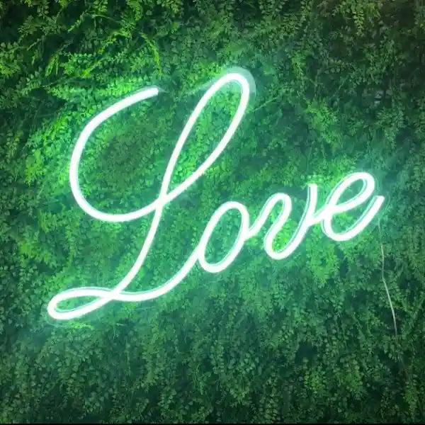 Love Romantic Wedding Neon Sign: A glowing symbol of eternal love and romance - from manhattonneons.com 