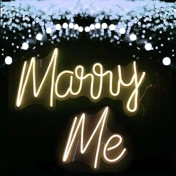 Marry Me Wedding Neon Sign - A luminous declaration of love and commitment, captured in glowing neon lights. - from manhattonneons.com