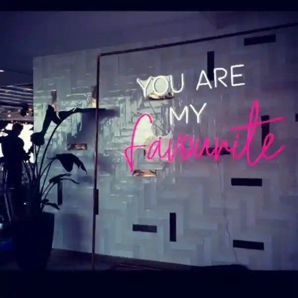 You Are My Favourite: A dazzling neon sign in vibrant colors, evoking feelings of love and warmth, perfect for wedding decor and romantic settings. - from manhattonneons.com